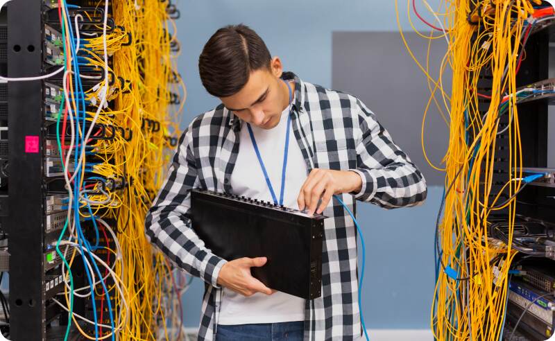 an IT admin managin server rack